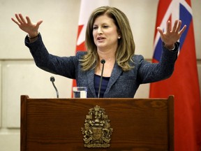 Conservative interim leader Rona Ambrose gestures at the start of a caucus meeting on December 2, 2015. 
REUTERS/Chris Wattie
