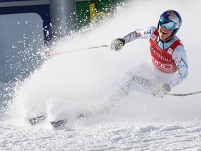 Lindsey Vonn of the United States reacts in the finish area following her run in the women’s World Cup downhill race at Lake Louise, Alta., Friday, Dec. 4, 2015. (THE CANADIAN PRESS/Jeff McIntosh)