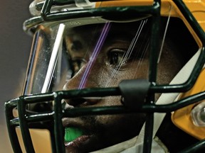 Running back Eddie Lacy of the Green Bay Packers watches from the sidelines during Thursday’s game against the Detroit Lions at Ford Field. (Andrew Weber/Getty Images/AFP)