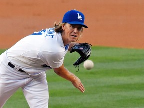 Los Angeles Dodgers starting pitcher Zack Greinke throws against the Philadelphia Phillies, Thursday, July 9, 2015, in Los Angeles. (AP Photo/Mark J. Terrill)