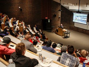 Jack J. Collins, a 2015 Premier's Award winner, speaks to 100 civil engineering technology students at St. Lawrence College on Friday. (Julia McKay/The Whig-Standard)