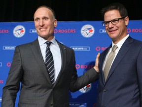 Blue Jays president Mark Shapiro (left) introduces Ross Atkins, the new general manager, on Friday, Dec. 4, 2015. (Veronica Henri/Toronto Sun)