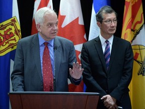 John McCallum, Minister of Immigration, Refugees and Citizenship, speaks after chairing the Federal-Provincial-Territorial Forum of Ministers responsible for Immigration meeting in Ottawa on Dec. 1, 2015. (THE CANADIAN PRESS/Sean Kilpatrick)