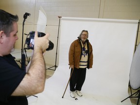 Dennis Shannon get his portrait done by photographer Peter Law.