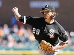 Chicago White Sox starting pitcher Jeff Samardzija throws against the Detroit Tigers, Monday, Sept. 21, 2015, in Detroit. (AP Photo/Carlos Osorio)