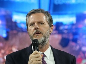 Jerry Falwell, President of Liberty University introduces U.S. Republican presidential candidate Ben Carson during a campaign rally at Liberty University, on November 11, 2015 in Lynchburg, Virginia. (Mark Wilson/Getty Images/AFP)