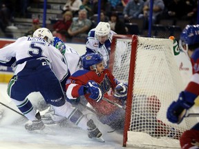 Edmonton Oil Kings' Tyler Robertson celebrates after scoring on Swift Current Broncos' Landon Bow  during first period WHL action at Rexall Place in Edmonton, Alberta on December 5, 2015. Perry Mah/Edmonton Sun/Postmedia Network