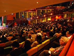 This April 2009 photo provided by Landry & Kling, Events at Sea, shows participants at a meeting held in the Tropical Theater of the Carnival Victory cruise ship. The ship housed attendees at the Fifth Summit of the Americas in Port of Spain, Trinidad. Cruise ships can serve as alternatives to land-based venues for meetings and conferences. (Joyce Landry via AP)