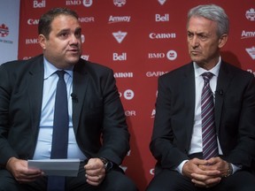 Canadian Soccer Association President Victor Montagliani with Canadian men's national soccer team coach Benito Floro. (THE CANADIAN PRESS/Darryl Dyck)