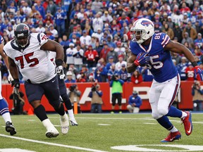 Buffalo Bills tight end Charles Clay runs after a catch as Houston Texans nose tackle Vince Wilfork pursues during the second half at Ralph Wilson Stadium. Buffalo beat Houston 30-21.  (Kevin Hoffman-USA TODAY Sports)