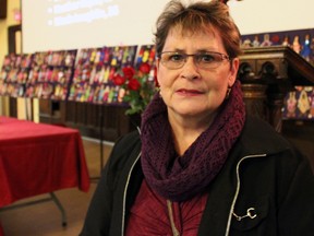 Jeannie Quinn, chair of the Kingston Anti-Violence Advisory Council, at the National Day of Remembrance and Action on Violence Against Women ceremony at Sydenham Street United Church on Sunday. (Steph Crosier/The Whig-Standard)