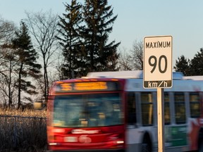 An OC Transept bus travels along the Transitway north of Fallowfield Station in Saturday, Dec. 5, 2015. 
Errol McGihon/Ottawa Sun/Postmedia Network