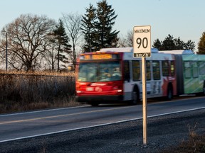 An OC Transept bus travels along the Transitway north of Fallowfield Station on Saturday December 5, 2015. 
Errol McGihon/Ottawa Sun/Postmedia Network