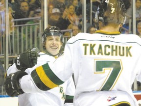 London Knights forward Mitch Marner celebrates his second goal of the game with teammate Matthew Tkachuk during their OHL hockey game against the Windsor Spitfires at Budweiser Gardens in London, Ont. on Friday December 4, 2015. (CRAIG GLOVER, The London Free Press)