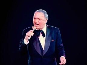 In this June 23, 1979 file photo, singer Frank Sinatra performs during his concert at the Nassau Coliseum, in Uniondale, N.Y. 100 is turning out to be a very good year for Sinatra. (AP Photo/Richard Drew, File)