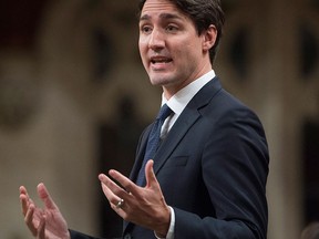 Prime Minister Justin Trudeau responds to a question on the government's speech from the throne, Monday Dec. 7, 2015 in the House of Commons on Parliament Hill in Ottawa. THE CANADIAN PRESS/Adrian Wyld