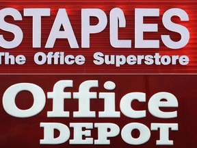 This combination made with 2009 file photos shows signage for a Staples store in Springfield, Ill., top, and an Office Depot store in Miami Springs, Fla.  (AP Photo/Seth Perlman, Alan Diaz, File)