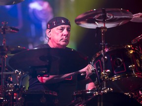 Neil Peart performs during a Rush concert at the Scotiabank Saddledome in Calgary, Alta., on Wednesday, July 15, 2015. (Lyle Aspinall/Postmedia Network)