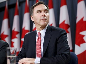 Finance Minister Bill Morneau takes part in a news conference in Ottawa, Canada, Dec. 7, 2015. REUTERS/Chris Wattie