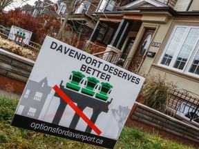 Signs in the Junction area of Toronto as people protest the Davenport rail project Sunday December 6, 2015. (Dave Thomas/Toronto Sun)