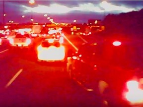 A Steve’s Towing truck is seen cutting off an A Towing truck in dashcam video Thursday, Dec. 3, 2015.