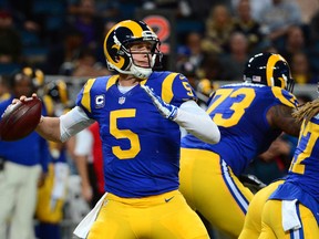 Rams quarterback Nick Foles passes against the Cardinals during second half NFL action in St. Louis on Sunday, Dec. 6, 2015. (Jeff Curry/USA TODAY Sports)