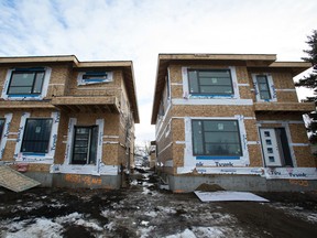 A Heritage Custom Homes infill development is seen west of 85 Street along 76 Avenue in the King Edward Park neighbourhood of Edmonton, Alta., on Sunday, Jan. 25, 2015.