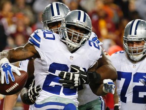 Cowboys running back Darren McFadden (20) celebrates his touchdown against the Redskins during second half NFL action in Landover, Md., on Monday, Dec. 7, 2015. (Alex Brandon/AP Photo)