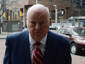 Sen. Mike Duffy, a former member of the Conservative caucus, arrives at the courthouse during his fraud and breach of trust trial earlier this month. THE CANADIAN PRESS/Sean Kilpatrick