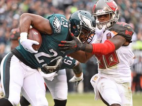 Philadelphia Eagles running back DeMarco Murray (29) is tackled by Tampa Bay Buccaneers linebacker Kwon Alexander (58) at Lincoln Financial Field. (Eric Hartline/USA TODAY Sports)