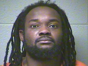This photo provided by the Woodford County Detention Center shows Ronald Exantus who was arrested in association with the breaking into a home in Versailles, Ky., Monday, Dec. 7, 2015. (Woodford County Detention Center via AP)
