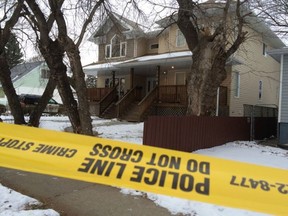 Police at the scene the day after an in-custody death that happened the evening of Dec. 8, 2015, near 120 Avenue and 58 Street. (PERRY MAH/EDMONTON SUN)