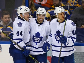 Toronto Maple Leafs centre Nazem Kadri (middle) is congratulated by Morgan Rielly (44) and Michael Grabner (40) after scoring against the St. Louis Blues at Scottrade Center. (Billy Hurst/USA TODAY Sports)