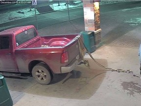 A botched attempt at pulling an ATM from the ground with a stolen truck on Dec. 7, 2015, has Grande Prairie Mounties calling for tips. (Police Photo)