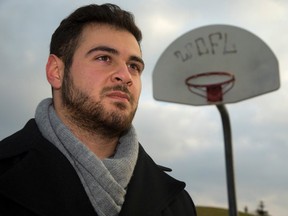 Ferras Hayek, now coaching basketball at Westminster secondary school, grew up in White Oaks and credits basketball with saving his life from bad choices. Hayek has raised funds for new nets at White Oaks Park in London, Ont. on Tuesday December 8, 2015. (MIKE HENSEN, The London Free Press)