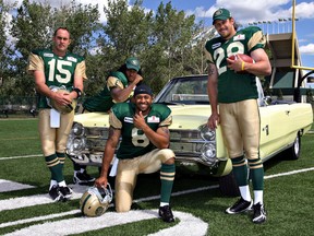 Former Eskimos (from left) Ricky Ray, Maurice Lloyd, Kamau Peterson and Jesse Lumsden pose in their 1960s duds for a Retro Night promotion in 2009. When it comes to finding CFL information and statistics, it can sometimes feel like every night is a throwback to the olden days. But the league has been working to address the issue and provide improved statistics. (Postmedia Network/Files)