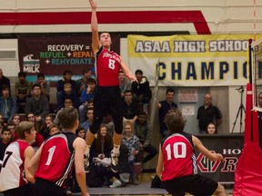 Jackson Kennedy (#8) shows his athletic ability by soaring high above the net in a Jasper Place Rebels victory during the provincial high school volleyball championships. In position to aid are Josh Kennedy (#1), Jared Krogan (#7) and Cory Isings (10). Next on the Jasper Place list of major sports functions is the annual REB invitational basketball tournament this weekend.