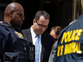 Former Subway pitchman Jared Fogle leaves the Federal Courthouse in Indianapolis, Wednesday, Aug. 19, 2015, following a hearing on child-pornography charges. Fogle agreed to plead guilty to allegations that he paid for sex acts with minors and received child pornography in a case that destroyed his career at the sandwich-shop chain and could send him to prison for more than a decade.  (AP Photo/Michael Conroy, File)