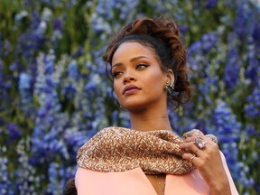 Singer Rihanna poses before attending the Spring/Summer 2016 women's ready-to-wear collection show for Dior fashion house during the Fashion Week in Paris, France, October 2, 2015.  REUTERS/Charles Platiau