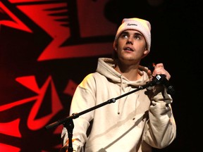 Justin Bieber performs at his sold out charity show at the Danforth Music Hall in Toronto, Ont. on Monday December 7, 2015. Michael Peake/Toronto Sun/Postmedia Network