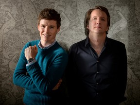 In this Oct. 25, 2015 file photo, British actor, Eddie Redmayne, left and British director, Tom Hooper pose for a portrait in promotion for "The Danish Girl" at a central London venue. The movie opens in U.S. theaters on Nov. 27, 2015. (Photo by Jonathan Short/Invision/AP, File)