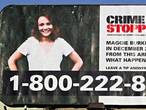 A billboard asking for tips on the disappearance of Maggie Burke, who went missing 11 years ago, is seen at the corner of 95 Street and 117 Avenue in Edmonton, Alta., on Wednesday, Dec. 9, 2015. Codie McLachlan/Edmonton Sun