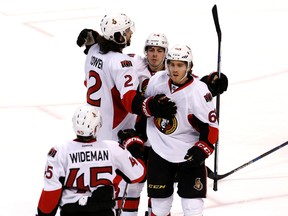 Dec 8, 2015; Sunrise, FL, USA; Ottawa Senators left wing Mike Hoffman (68) celebrates his goal with defenseman Jared Cowen (2), center Jean-Gabriel Pageau (44) and defenseman Chris Wideman (45) against the Florida Panthers in the third period at BB&T; Center.  The Senators won 4-2. Mandatory Credit: Robert Mayer-USA TODAY Sports