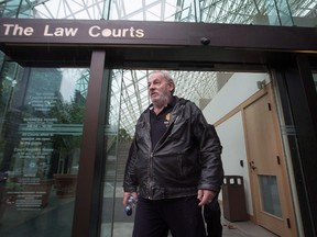 Ivan Henry,leaves B.C. Supreme Court during a lunch break in Vancouver, B.C., on Monday August 31, 2015. The lawyer of a man wrongfully imprisoned for 27 years says her client's 1983 sexual-assault trial is Canada's most egregious example of the Crown withholding evidence. THE CANADIAN PRESS/Darryl Dyck