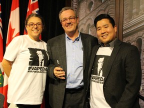 Left to right, Toronto vape shop owner Maria Papaioannoy, PC MPP Randy Hillier and Aaron Lepcha, a Toronto e-liquid manufacturer say the Ontario government shouldn't crackdown on e-cigarette use at a Queen's Park news conference on Dec. 9, 2015. (Antonella Artuso/Toronto Sun)