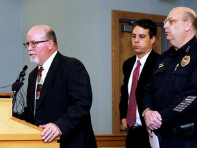 Canon City School Superintendent George Welsh, left, addresses the media, as from second left, District Attorney Thom LeDoux, Canon City Police Chief Paul Schultz and Detective Clint Robertson listen during a news conference, Wednesday Dec. 9, 2015, in Canon City, Colo., regarding an investigation into nude photo sexting among high school students. No charges will be filed against students involved in the widespread sexting scandal at the southern Colorado high school, they said. (Tracy Harmon/The Pueblo Chieftain via AP)