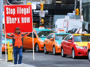 Toronto cab protesters in front of City Hall on Wednesday, December 9, 2015. (Michael Peake/Toronto Sun)