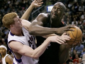 Former Raptors' Matt Bonner battles with Heat centre Shaquille O’Neal during the 2005 season. Bonner has now been with the Spurs for 10 seasons. (Reuters)