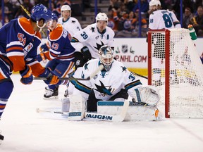 Oilers forward Jujhar Khaira is stopped by Sharks goalie Martin Jones during the first period of Wednesday`s game at Rexall Place. (Ian Kucerak, Edmonton Sun)