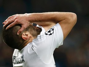 Real Madrid’s Karim Benzema reacts during his team’s Champions League match against Malmo at Santiago Bernabeu stadium in Madrid, December 8, 2015. (REUTERS/Juan Medina)